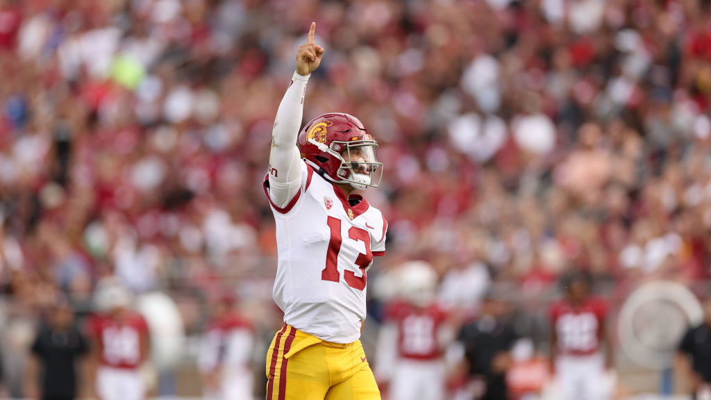 Caleb Williams #13 of the USC Trojans reacts after he threw a touchdown pass against the Stanford C...