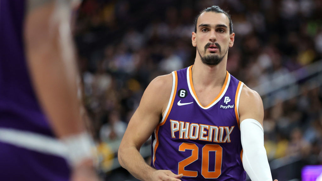 LAS VEGAS, NEVADA - OCTOBER 05: Dario Saric #20 of the Phoenix Suns checks into a preseason game ag...