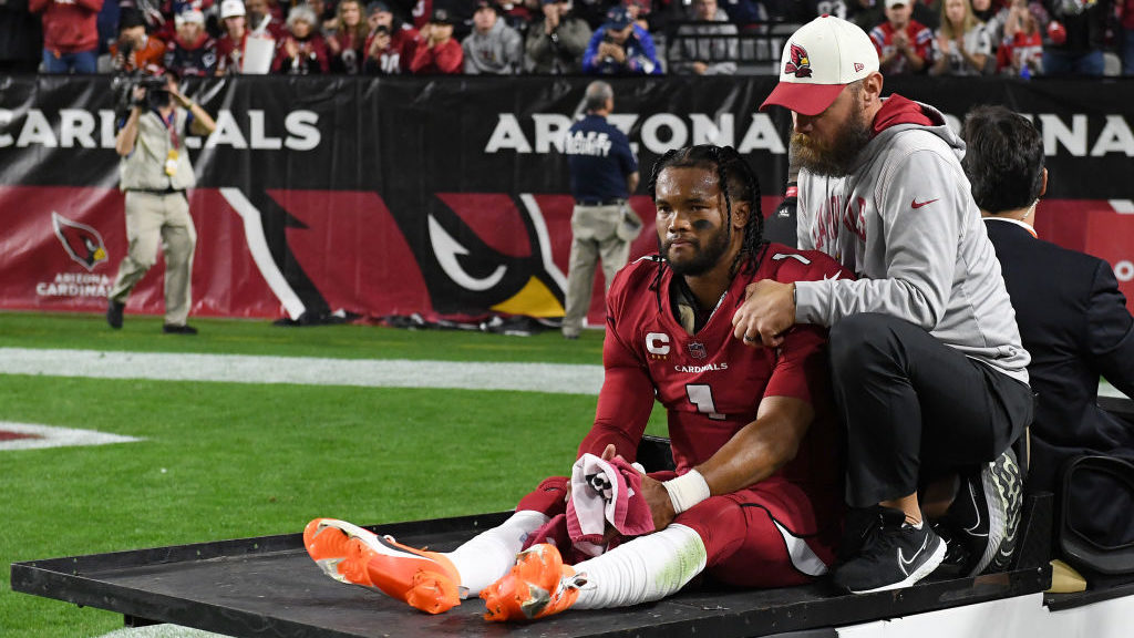 Kyler Murray #1 of the Arizona Cardinals is carted off the field after being injured against the Ne...