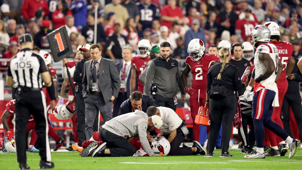 Kyler Murray #1 of the Arizona Cardinals is looked over on the field after being injured against th...