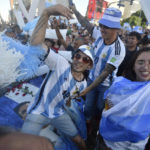 
              Argentina soccer fans celebrate their team's victory over Croatia at the end of the team's World Cup semifinal match in Qatar after watching it on TV in Buenos Aires, Argentina, Tuesday, Dec. 13, 2022. (AP Photo/Gustavo Garello)
            