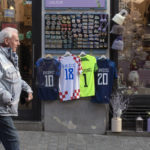 Croatia's national soccer team jerseys are seen at a souvenir shop ahead of the team's Qatar World Cup soccer semifinal match against Argentina, in Zagreb, Croatia, Tuesday, Dec. 13, 2022. (AP Photo/Marko Drobnjakovic)