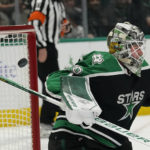 Dallas Stars goaltender Jake Oettinger (29) can't stop the shot allowing a goal by Minnesota Wild's Jake Middleton during the second period of an NHL hockey game in Dallas, Sunday, Dec. 4, 2022. (AP Photo/LM Otero)