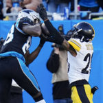 Pittsburgh Steelers cornerback Cameron Sutton gets a pass interfering call against Carolina Panthers wide receiver Terrace Marshall Jr. during the second half of an NFL football game between the Carolina Panthers and the Pittsburgh Steelers on Sunday, Dec. 18, 2022, in Charlotte, N.C. (AP Photo/Rusty Jones)