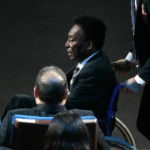 
              FILE - Brazilian soccer legend Pele is pushed in a wheelchair as he arrives at the 2018 World Cup soccer draw at the Kremlin in Moscow, Dec. 1, 2017. Pelé, the Brazilian king of soccer who won a record three World Cups and became one of the most commanding sports figures of the last century, died in Sao Paulo on Thursday, Dec. 29, 2022. He was 82.  (AP Photo/Ivan Sekretarev, File)
            