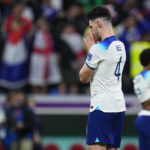 England's Declan Rice reacts following the World Cup quarterfinal soccer match between England and France, at the Al Bayt Stadium in Al Khor, Qatar, Sunday, Dec. 11, 2022. (AP Photo/Natacha Pisarenko)