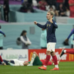 
              France's Antoine Griezmann at the end of the World Cup semifinal soccer match between France and Morocco at the Al Bayt Stadium in Al Khor, Qatar, Wednesday, Dec. 14, 2022. France won 2-0. (AP Photo/Christophe Ena)
            