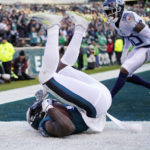
              Philadelphia Eagles' A.J. Brown falls after scoring a touchdown during the second half of an NFL football game against the Tennessee Titans, Sunday, Dec. 4, 2022, in Philadelphia. (AP Photo/Matt Slocum)
            