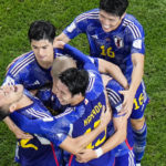 
              Japan's Daizen Maeda celebrates with his teammates after scoring his side's opening goal during the World Cup round of 16 soccer match between Japan and Croatia at the Al Janoub Stadium in Al Wakrah, Qatar, Monday, Dec. 5, 2022. (AP Photo/Hassan Ammar)
            