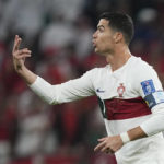 Portugal's Cristiano Ronaldo gestures after entering the pitch during the World Cup quarterfinal soccer match between Morocco and Portugal, at Al Thumama Stadium in Doha, Qatar, Saturday, Dec. 10, 2022. (AP Photo/Martin Meissner)