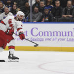 Carolina Hurricanes' Calvin de Haan (44) shoots the puck against the St. Louis Blues during the first period of an NHL hockey game Thursday, Dec. 1, 2022, in St. Louis. (AP Photo/Michael Thomas)