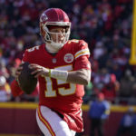 Kansas City Chiefs quarterback Patrick Mahomes drops back to pass during the first half of an NFL football game against the Seattle Seahawks Saturday, Dec. 24, 2022, in Kansas City, Mo. (AP Photo/Ed Zurga)