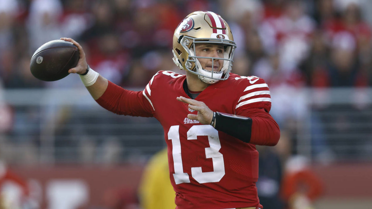 San Francisco 49ers quarterback Brock Purdy throws to a receiver in the first half of an NFL footba...