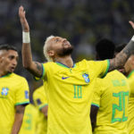 
              Brazil's Neymar celebrates after scoring his side's second goal during the World Cup round of 16 soccer match between Brazil and South Korea, at the Education City Stadium in Al Rayyan, Qatar, Monday, Dec. 5, 2022. (AP Photo/Manu Fernandez)
            