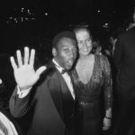 
              FILE - Brazilian soccer star Pele and his girlfriend Xuxa arrive to see the screening of the Spanish movie Carmen, directed by Carlos Saura, at the film festival in Cannes, France, May 15, 1983. Pelé, the Brazilian king of soccer who won a record three World Cups and became one of the most commanding sports figures of the last century, died in Sao Paulo on Thursday, Dec. 29, 2022. He was 82.  (AP Photo, File)
            