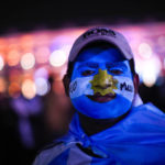 A fan of Argentina team poses for a photograph at the end of the World Cup semifinal soccer match between Argentina and Croatia played at the Lusail Stadium, in Doha, Qatar, Tuesday, Dec. 13, 2022. Argentina won 3-0. (AP Photo/Francisco Seco)