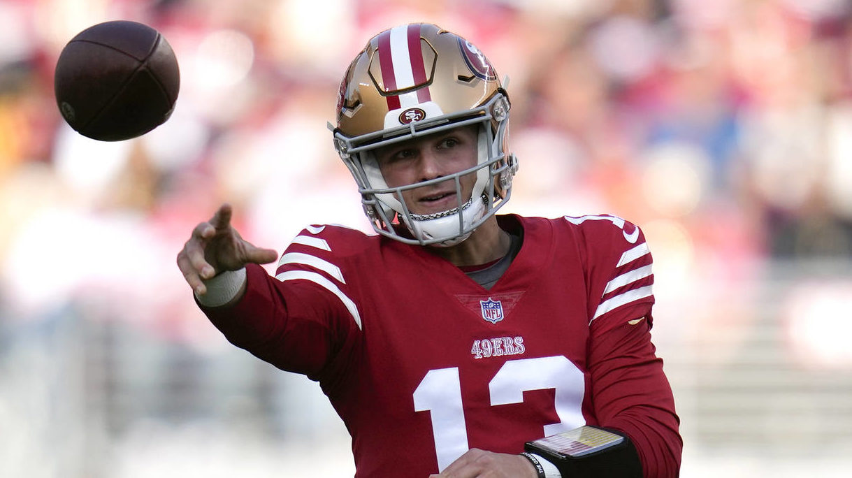 San Francisco 49ers quarterback Brock Purdy (13) throws to a receiver in the first half of an NFL f...