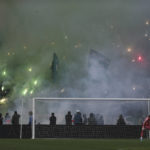 
              Fans of Raja AC light flares during a match against FAR Rabat, in the Moroccan league, in Rabat, Morocco, Wednesday, Feb. 12, 2020. (AP Photo/Mosa'ab Elshamy)
            