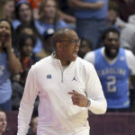 
              North Carolina head coach Hubert Davis reacts in the second half of an NCAA college basketball game against Virginia Tech in Blacksburg Va., Sunday Dec. 4, 2022. (Matt Gentry/The Roanoke Times via AP)
            