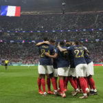
              France players celebrate after Theo Hernandez scored the opening goal during the World Cup semifinal soccer match between France and Morocco at the Al Bayt Stadium in Al Khor, Qatar, Wednesday, Dec. 14, 2022. (AP Photo/Christophe Ena)
            