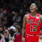 Chicago Bulls guard Ayo Dosunmu reacts after making a buzzer beater against the Atlanta Hawks during the second half of an NBA basketball game, Wednesday, Dec. 21, 2022, in Atlanta. (AP Photo/Hakim Wright Sr.)
