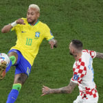 
              Brazil's Neymar, left, duels for the ball with Croatia's Marcelo Brozovic during the World Cup quarterfinal soccer match between Croatia and Brazil, at the Education City Stadium in Al Rayyan, Qatar, Friday, Dec. 9, 2022. (AP Photo/Pavel Golovkin)
            