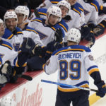St. Louis Blues' Pavel Buchnevich (89) returns to the bench after scoring during the first period of the team's NHL hockey game against the Pittsburgh Penguins in Pittsburgh, Saturday, Dec. 3, 2022. (AP Photo/Gene J. Puskar)