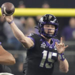 TCU quarterback Max Duggan (15) throws in the first half of the Big 12 Conference championship NCAA college football game against Kansas State, Saturday, Dec. 3, 2022, in Arlington, Texas. (AP Photo/LM Otero)