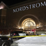 
              Officials lock down the west wing of the Mall of America after a shooting was reported Friday, Dec. 23, 2022 in Bloomington, Minn. A shooting sent the Mall of America into lockdown Friday evening, mall officials and police in suburban Minneapolis said. (Alex Kormann/Star Tribune via AP)
            