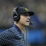 Michigan head coach Jim Harbaugh watches from the sidelines during the second half of the Big Ten championship NCAA college football game against Purdue, Saturday, Dec. 3, 2022, in Indianapolis. (AP Photo/Darron Cummings)