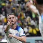 
              England's Jordan Henderson celebrates after scoring his side's first goal during the World Cup round of 16 soccer match between England and Senegal, at the Al Bayt Stadium in Al Khor, Qatar, Sunday, Dec. 4, 2022. (AP Photo/Hassan Ammar)
            