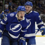 Tampa Bay Lightning center Vladislav Namestnikov (90) celebrates his goal against the Toronto Maple Leafs with center Ross Colton (79) during the second period of an NHL hockey game Saturday, Dec. 3, 2022, in Tampa, Fla. (AP Photo/Chris O'Meara)