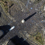 Argentine soccer fans descend on the capital's Obelisk to celebrate their team's World Cup victory over France, in Buenos Aires, Argentina, Sunday, Dec. 18, 2022. (AP Photo/Rodrigo Abd)
