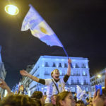 
              Argentina fans celebrate in Madrid downtown, Spain after the World Cup final soccer match between Argentina and France in Qatar, Sunday, Dec. 18, 2022. (AP Photo/Andrea Comas)
            