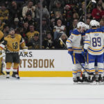 Buffalo Sabres players celebrate a goal against the Vegas Golden Knights during the second period of an NHL hockey game Monday, Dec. 19, 2022, in Las Vegas. (AP Photo/John Locher)