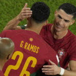 
              Portugal's Cristiano Ronaldo embraces team mate Goncalo Ramos during his substitution at the World Cup group H soccer match between Portugal and Ghana, at the Stadium 974 in Doha, Qatar, Thursday, Nov. 24, 2022. (AP Photo/Francisco Seco)
            