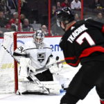 
              Los Angeles Kings goaltender Pheonix Copley watches the puck on a shot by Ottawa Senators left wing Brady Tkachuk (7) during the second period of an NHL hockey game, Tuesday, Dec. 6, 2022, in Ottawa, Ontario. (Justin Tang/The Canadian Press via AP)
            