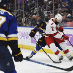 
              Carolina Hurricanes' Brent Burns (8) vies for the puck against St. Louis Blues' Ryan O'Reilly (90) during the second period of an NHL hockey game Thursday, Dec. 1, 2022, in St. Louis. (AP Photo/Michael Thomas)
            