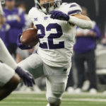 Kansas State running back Deuce Vaughn (22) carries in the first half of the Big 12 Conference championship NCAA college football game against TCU, Saturday, Dec. 3, 2022, in Arlington, Texas. (AP Photo/LM Otero)