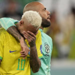 Brazil's Neymar reacts after the penalty shootout besides Brazil's goalkeeper Ederson at the World Cup quarterfinal soccer match between Croatia and Brazil, at the Education City Stadium in Al Rayyan, Qatar, Friday, Dec. 9, 2022. (AP Photo/Martin Meissner)