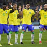 
              Brazil's Neymar, from right, celebrates with team mates Lucas Paqueta, Raphinha and Vinicius Junior after scoring his side's second goal during the World Cup round of 16 soccer match between Brazil and South Korea, at the Education City Stadium in Al Rayyan, Qatar, Monday, Dec. 5, 2022. (AP Photo/Manu Fernandez)
            