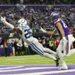 Indianapolis Colts safety Rodney McLeod (26) breaks up a pass intended for Minnesota Vikings tight end T.J. Hockenson, right, during the second half of an NFL football game, Saturday, Dec. 17, 2022, in Minneapolis. (AP Photo/Abbie Parr)