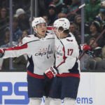 
              Washington Capitals defenseman Martin Fehervary and center Dylan Strome celebrate after Fehervary's goal during the first period of an NHL hockey game against the Seattle Kraken, Thursday, Dec. 1, 2022, in Seattle. (AP Photo/Jason Redmond)
            