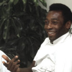 
              FILE - New York Cosmo's soccer star, Pele, is seen during an interview at in New York on July 1, 1975. Dozens of meetings over four years led to Pelé agreeing to sign with Cosmos in June 1975. His 2 1/2 seasons in New York elevated the sport, putting U.S. soccer on a path to hosting the World Cup in 1994 and launching Major League Soccer two years later. (AP Photo/Suzanne Vlamis, File)
            