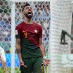 
              Portugal's Bruno Fernandes reacts after failing to score during the World Cup group H soccer match between Portugal and Uruguay, at the Lusail Stadium in Lusail, Qatar, Monday, Nov. 28, 2022. (AP Photo/Petr David Josek)
            