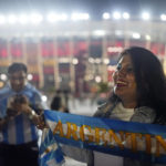 
              FILE - An Argentina soccer fan from India waits outside before the World Cup group C soccer match between Poland and Argentina at the Stadium 974 in Doha, Qatar, Wednesday, Nov. 30, 2022. (AP Photo/Natacha Pisarenko, File)
            