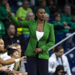 Notre Dame head coach Niele Ivey calls a play during the first half of an NCAA college basketball game against Connecticut on Sunday, Dec. 4, 2022, in South Bend, Ind. (AP Photo/Michael Caterina)