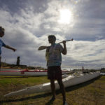 
              Rapanui Konturi Atan, a 36-year-old historian, right, receives instructions from Gilles Bordes, at the start of a training session for the Hoki Mai challenge, a canoe voyage — covering almost 500 kilometers, or about 300 miles across a stretch of the Pacific Ocean, in Rapa Nui, a territory that is part of Chile and is better known as Easter Island, Thursday, Nov. 24, 2022. Bordes, coordinator of Hoki Mai, moved to Rapa Nui earlier this year, but he has lived in Polynesia for three decades, devoting much of his time to rowing. (AP Photo/Esteban Felix)
            