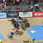 
              =Riders crash on the final lap in the men's 15km scratch race qualifying during the Commonwealth Games track cycling at Lee Valley VeloPark in London, Sunday, July 31, 2022. (AP Photo/Ian Walton)
            