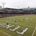 
              Louisville meets Cincinnati  during the first quarter of the Fenway Bowl NCAA college football game at Fenway Park Saturday, Dec. 17, 2022, in Boston. (AP Photo/Winslow Townson)
            